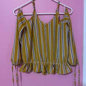 Yellow blouse with white and black stripes